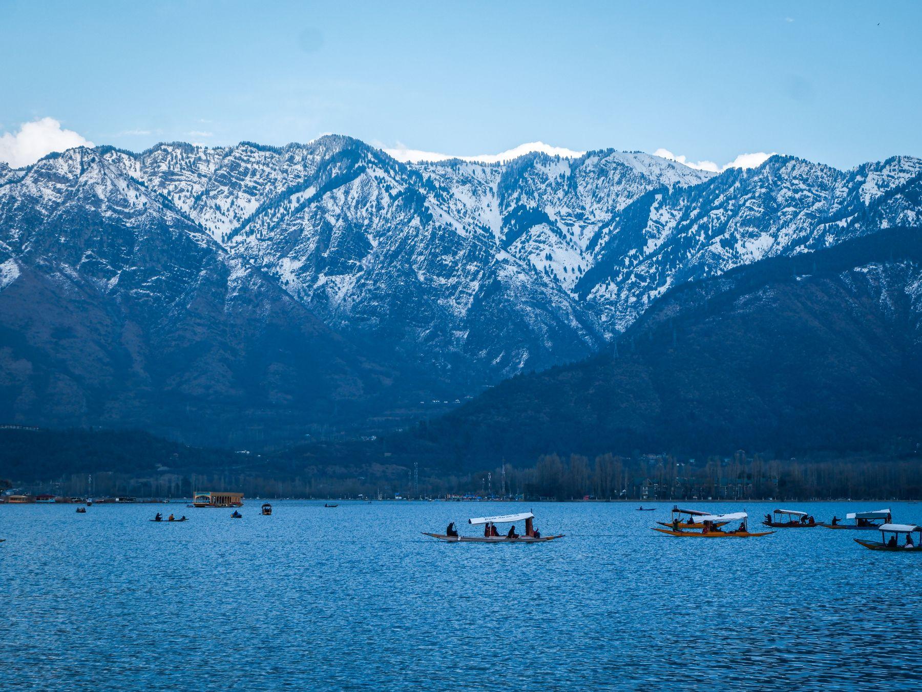 Dal Lake in Srinagar with a mountain backdrop
