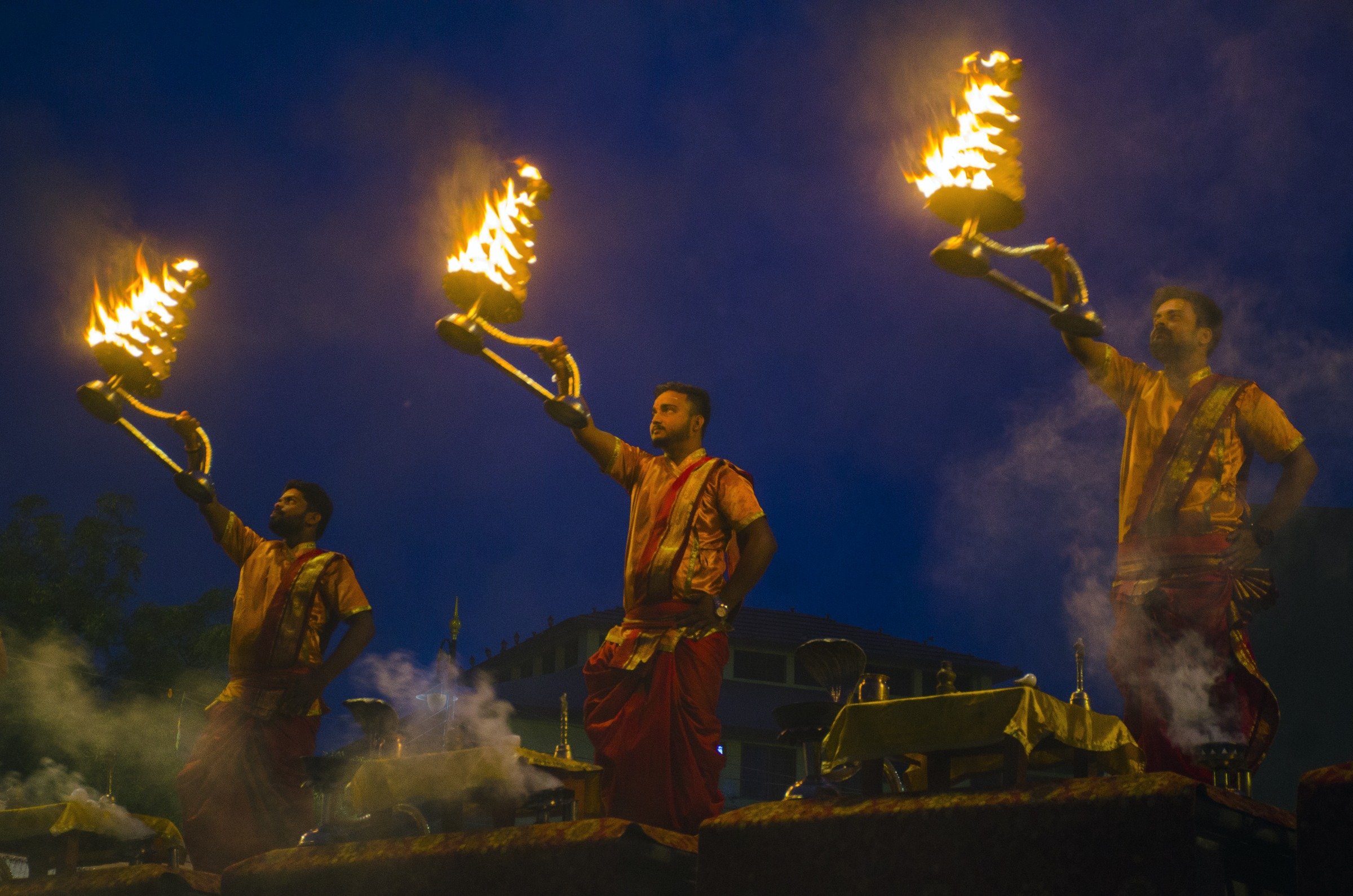 Priests perform the morning Ganga Aarti in Varanasi